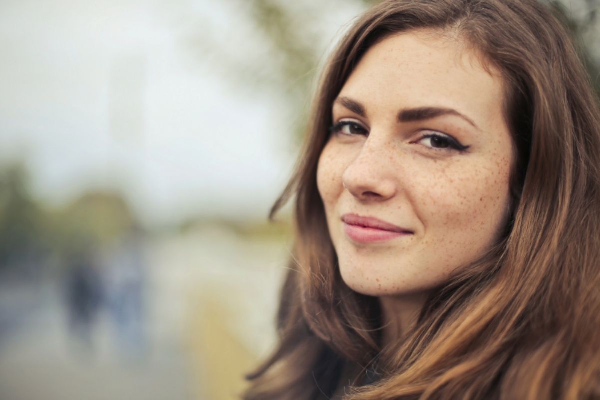 Lady with brown hair looking into the camera